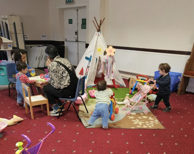 Toddlers playing at a local community playgroup in Chorlton